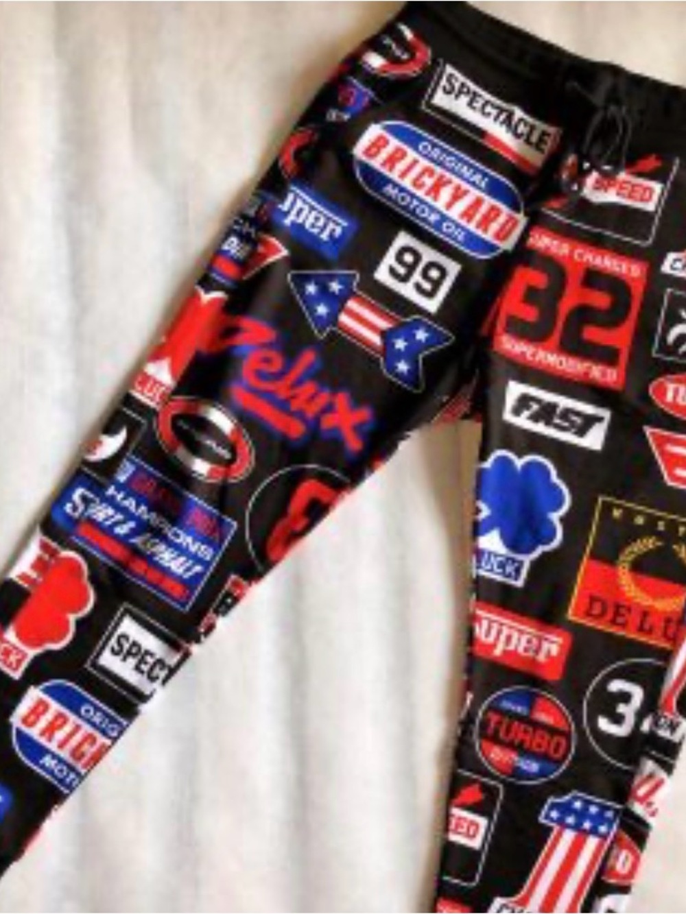 Love Moschino Black Joggers with Red & Blue Graphic Accents